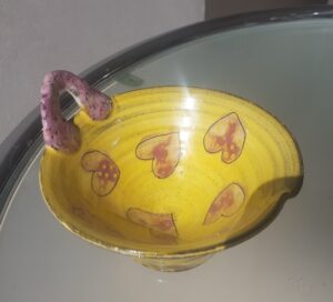 Cut one handle with purple heart pattern