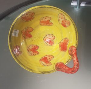 Cut a handle  orange heart pattern