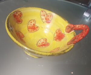 Cut a handle  orange heart pattern